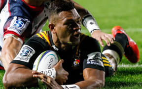 Seta Tamanivalu scores against the Rebels.