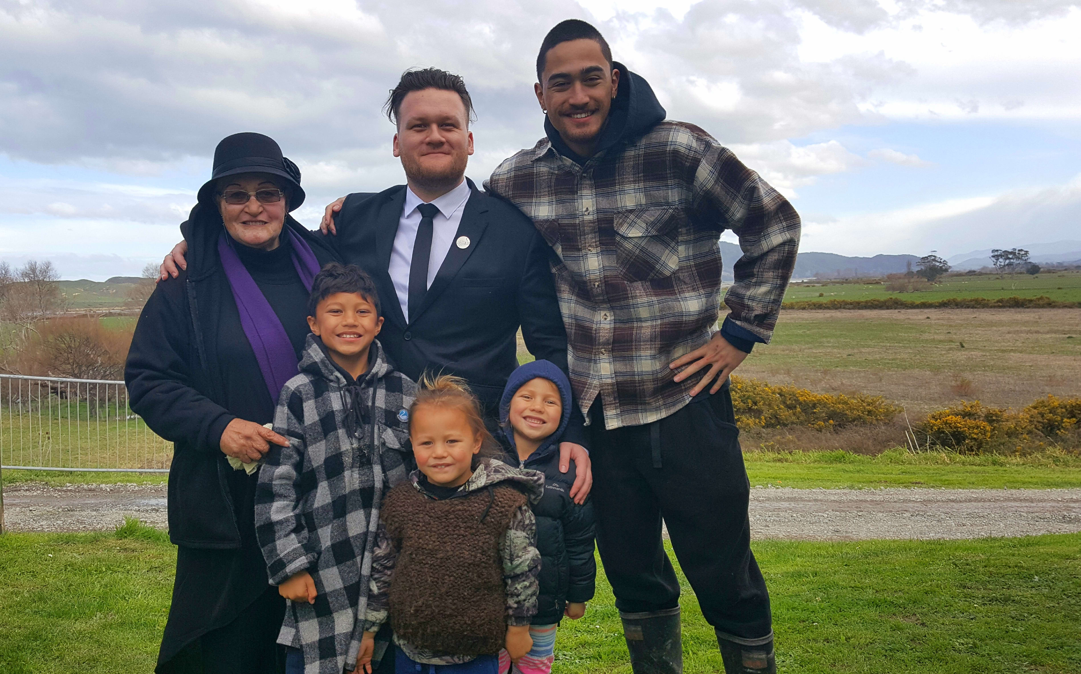 Ramari Nepia, left, Callum Phillips,centre, and whānau.