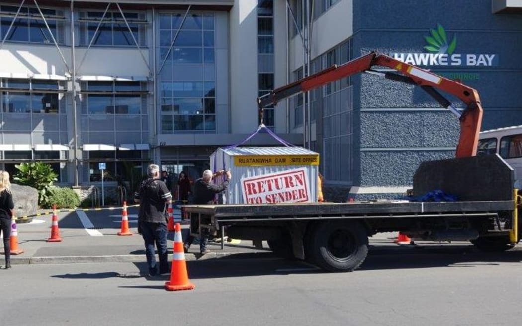 Greenpeace drop off the site office of the proposed Ruataniwha Dam at the Hawke's Bay Regional Council.
