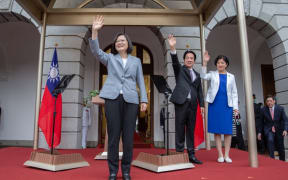 Taiwan president Tsai Ing-wen and Vice President William Lai wave during their inauguration in Taipei after her landslide victory in the Taiwanese Presidential Election.
