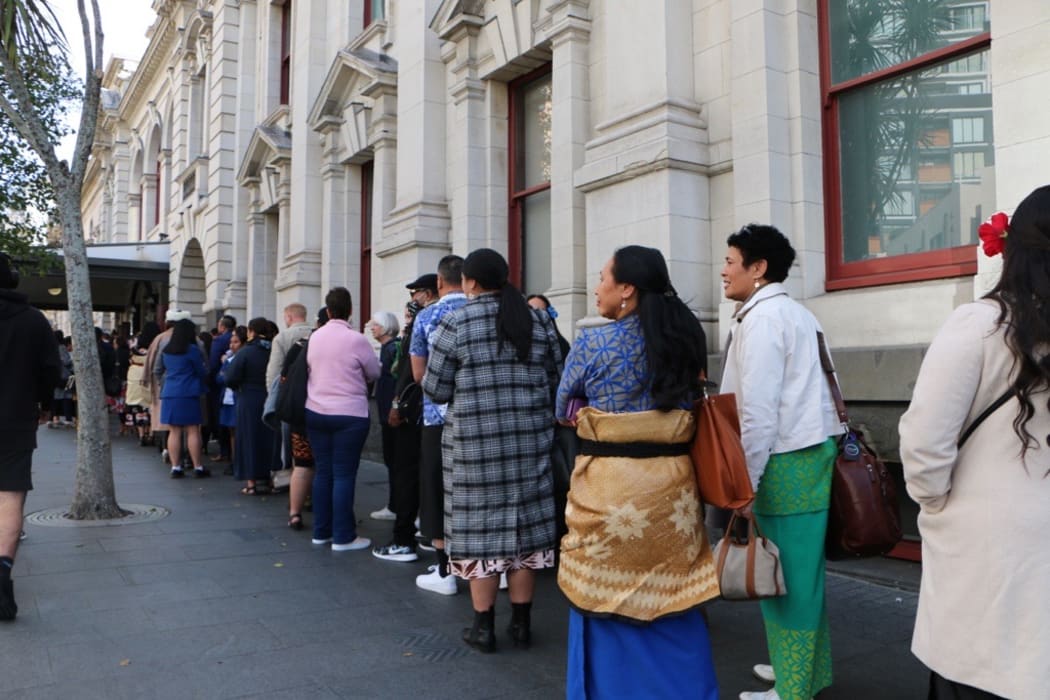 The queue to get into the Auckland Town Hall ahead of the apology.