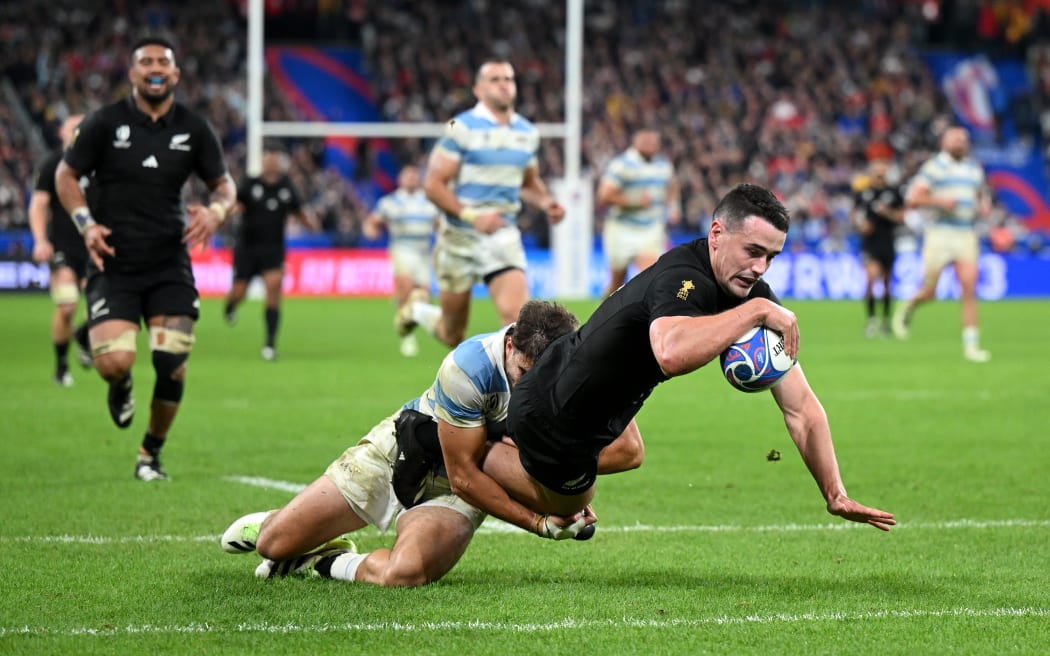 Will Jordan of New Zealand scores his team's seventh try during the Rugby World Cup France 2023 semi-final match between Argentina and New Zealand at Stade de France
