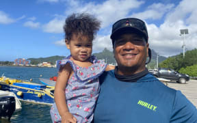Cook Islands fisherman Michael Tou and his daughter Aki.