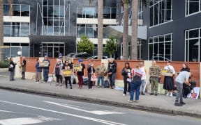People protesting outside MSD's office in Ellerslie.