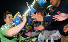 Ben Smith enjoys the adulation of Highlanders fans after their semi-final win over the NSW Waratahs.