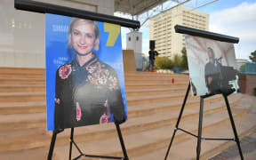 ALBUQUERQUE, NEW MEXICO - OCTOBER 23: Photos of cinematographer Halyna Hutchins are displayed before a vigil held to honor her at Albuquerque Civic Plaza on October 23, 2021 in Albuquerque, New Mexico. Hutchins was killed on set while filming the movie "Rust" at Bonanza Creek Ranch near Santa Fe, New Mexico on October 21, 2021. The film's star and producer Alec Baldwin discharged a prop firearm that hit Hutchins and director Joel Souza.   Sam Wasson/Getty Images/AFP (Photo by Sam Wasson / GETTY IMAGES NORTH AMERICA / Getty Images via AFP)