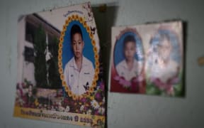 Photographs of Pheeraphat 'Night' Sompiengjai, one of the members of a Thai youth football team currently trapped at the Tham Luang cave.