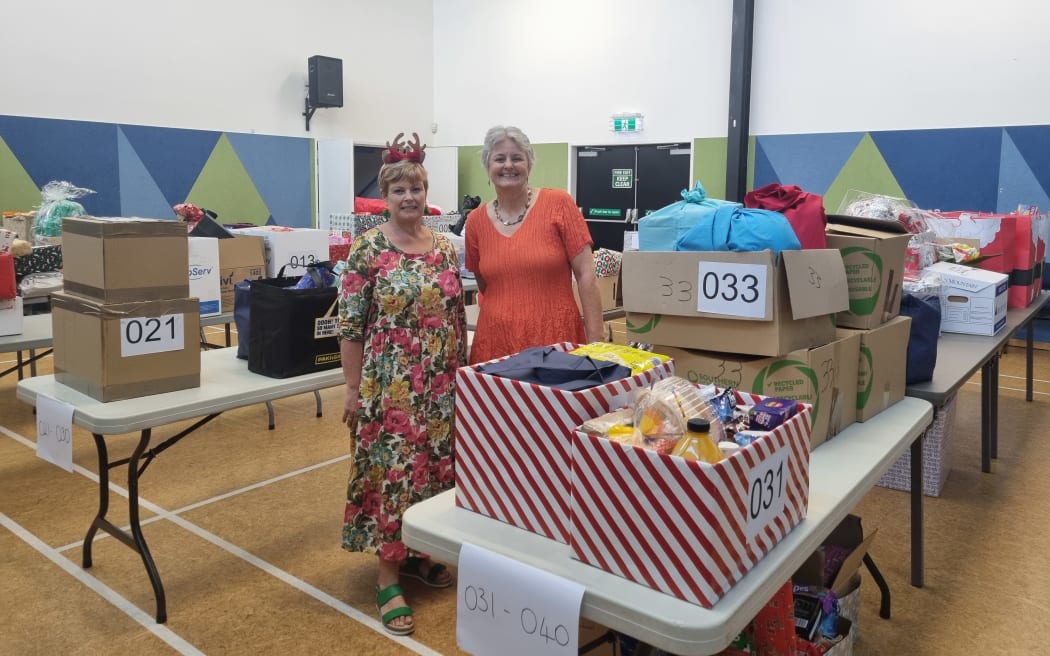 Glenda Marshall (left), Christchurch Methodist Mission administrator, and Jill Hawkey, the mission's executive director are helping to keep track of the hampers arriving and departing on the big day.