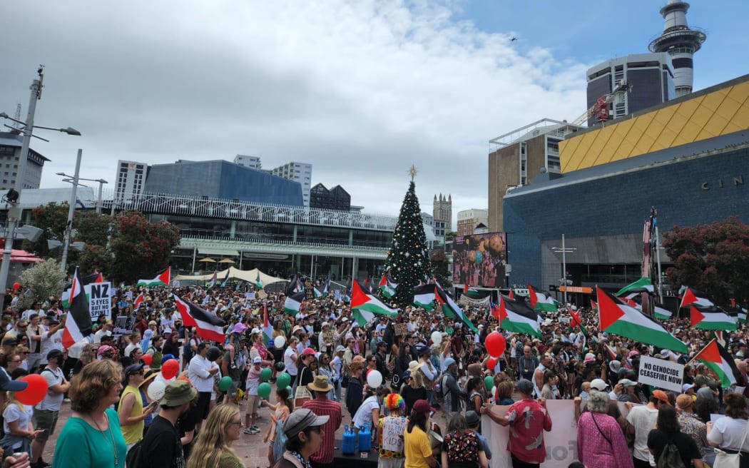 Crowds converge on Auckland's Aotea Square for a 'All Out For Palestine' march Sunday.