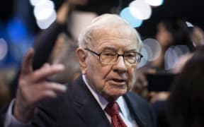(FILES) In this file photo taken on May 4, 2019, Warren Buffett, CEO of Berkshire Hathaway, speaks to the press as he arrives at the 2019 annual shareholders meeting in Omaha, Nebraska.