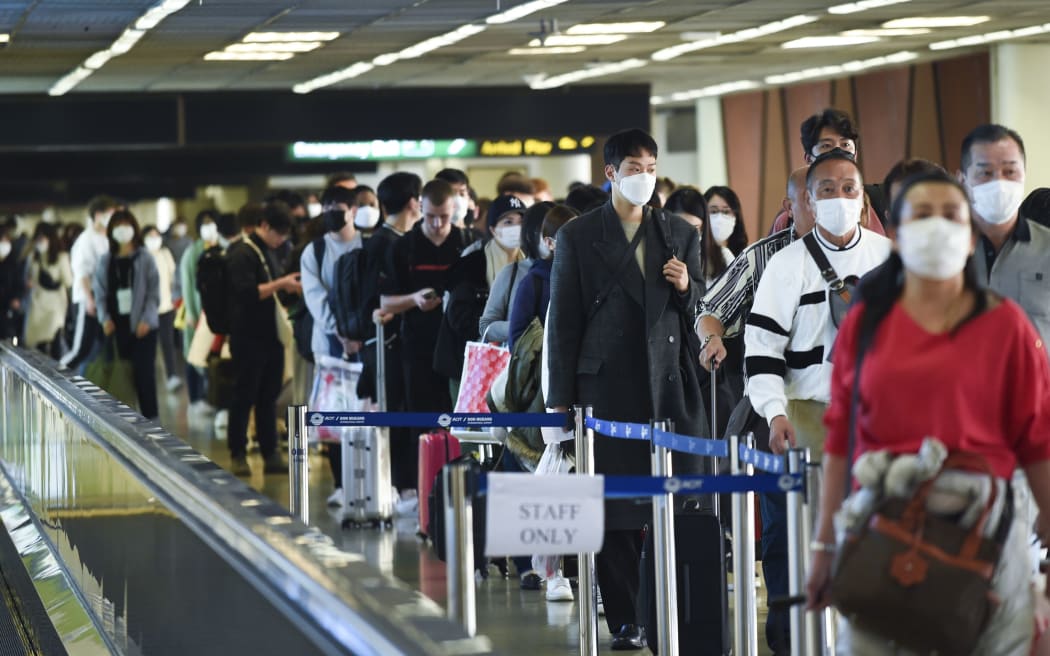 Tourists wear masks at Don Mueang Airport, in Bangkok, Thailand, 07 February 2020.