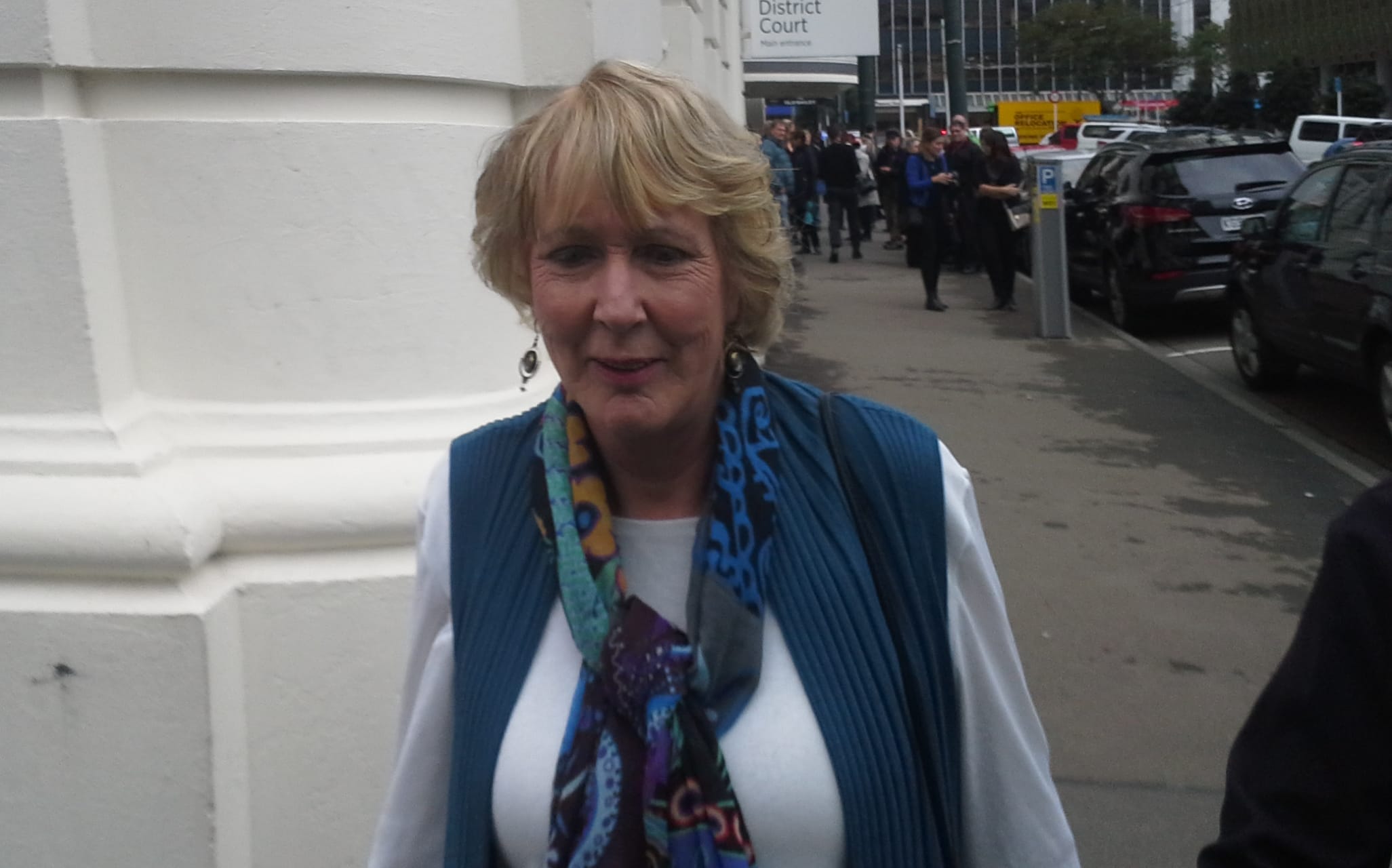 Susan Austen leaves court after denying three charges connected with assisted suicide.