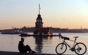 ISTANBUL, TURKEY - APRIL 19: A man is seen on Uskudar Coastal Road near Maiden's Tower in Istanbul, Turkey on April 19, 2020 after restrictions re-imposed in 31 provinces for two days as part of measures to stem the spread of the coronavirus (COVID-19).