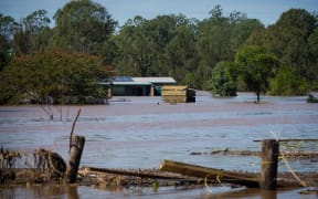 Logan River, near Logan city south of Brisbane, remained heavily flooded on Saturday after peaking at 15m on Friday in the worst flooding in the city's history.