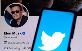 April 11, 2022, Brazil. In this photo illustration the Twitter logo seen displayed on a smartphone with the Elon Musk's official Twitter profile