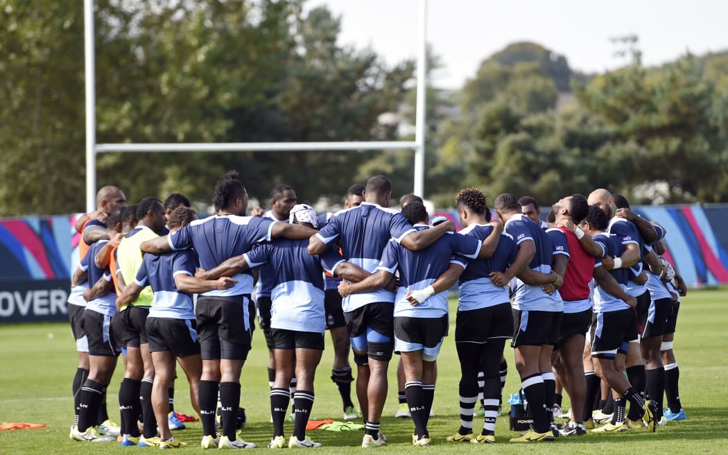 Fiji's players gather together during a Fiji team training session in Swansea.