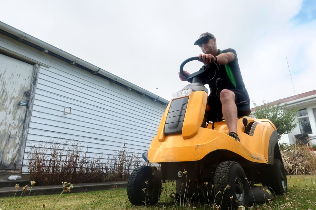 Straight Lines owner Neil Holdaway says he will lose customers if he puts his mowing prices up.