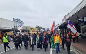 Close to 200 people have gathered in Dargaville on 14 December to protest against the Kaipara mayor.