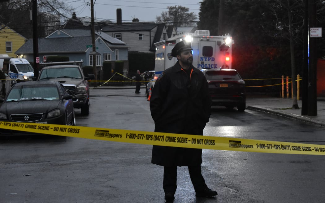 A police officer at the scene of the stabbing. (Photo by Kyle Mazza/NurPhoto) (Photo by Kyle Mazza / NurPhoto / NurPhoto via AFP)