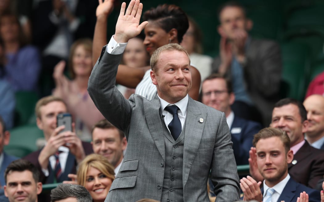 Sir Chris Hoy - not in lycra - acknowledges the crowd at Wimbledon.