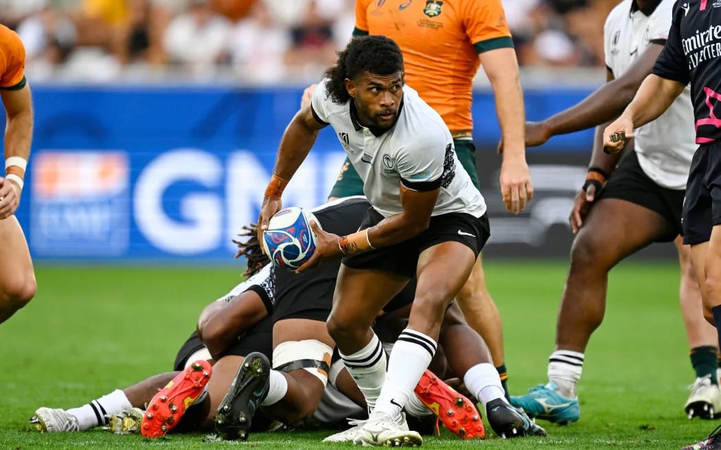 Simione Kuruvoli sets up to fire a pass out against the Wallabies in Saint Entienne, France during the 2023 Rugby World Cup. Kuruvoli kicked Fiji to beating the Wallabies for the first time in 69 years, on Sunday 17 September 2023. Photo: Andrew Cornaga/www.photosport.nz