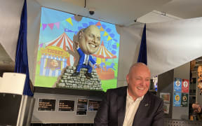 National Party leader Christopher Luxon with his new puppet at Backbencher Gastropub in Wellington.