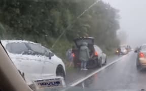 Dozens of cars were shown in a video online damaged by potholes.