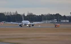 A plane on the runway at Christchurch Airport.