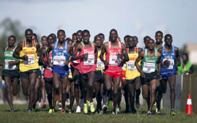 Athletes compete in the men's senior 10km marathon during the World Cross-County Championships in Kampala, Uganda.
