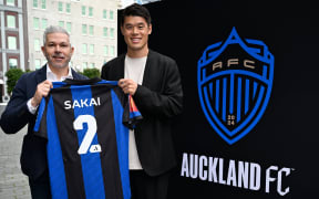 Japanese defender and professional football player Hiroki Sakai with coach Steve Corica (left)