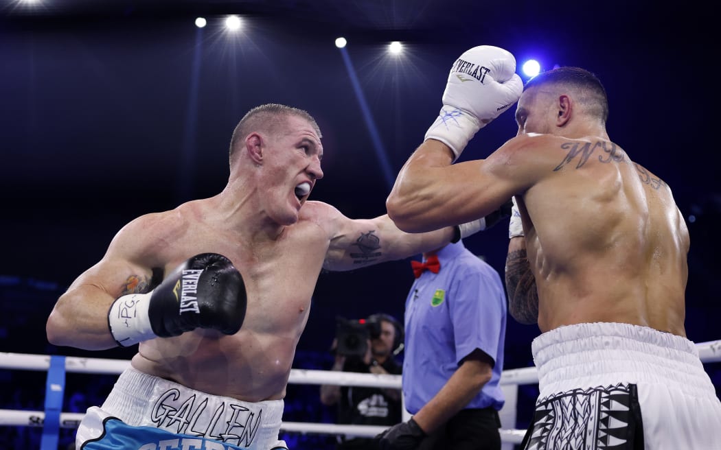 SYDNEY, AUSTRALIA - JULY 16: Paul Gallen punches Sonny Bill Williams during their heavyweight bout at Qudos Bank Arena on July 16, 2025 in Sydney, Australia. (Photo by Darrian Traynor/Getty Images)