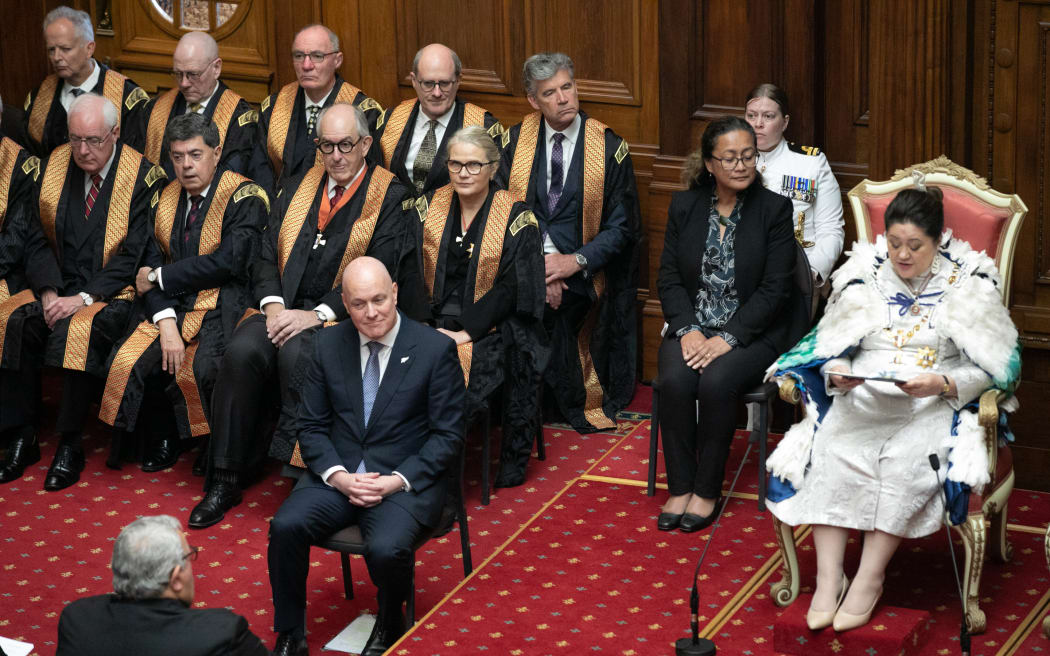 The Governor-General Dame Cindy Kiro reads the Speech from the Throne while new Prime Minister Christopher Luxon listens. The Speech is prepared by the new government and outlines its priorities and policy direction.