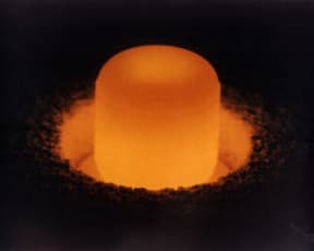 A glowing cylinder of plutonium-238