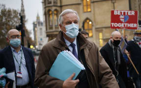 EU chief negotiator Michel Barnier walks back to Brexit talks for a trade deal between the EU and the UK, in central London.