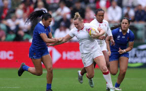 Marlie Packer of England is challenged by Davina Lasini of Samoa during the Women's Rugby World Cup 2025 Pool A match between England and Samoa at Franklin's Gardens on 30 August, 2025 in Northampton, England.
