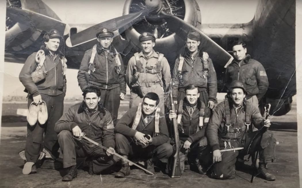 Standing at far right, 1st Lt. Si Spiegel flew 35 combat missions over Europe, including two after he crash-landed in Poland