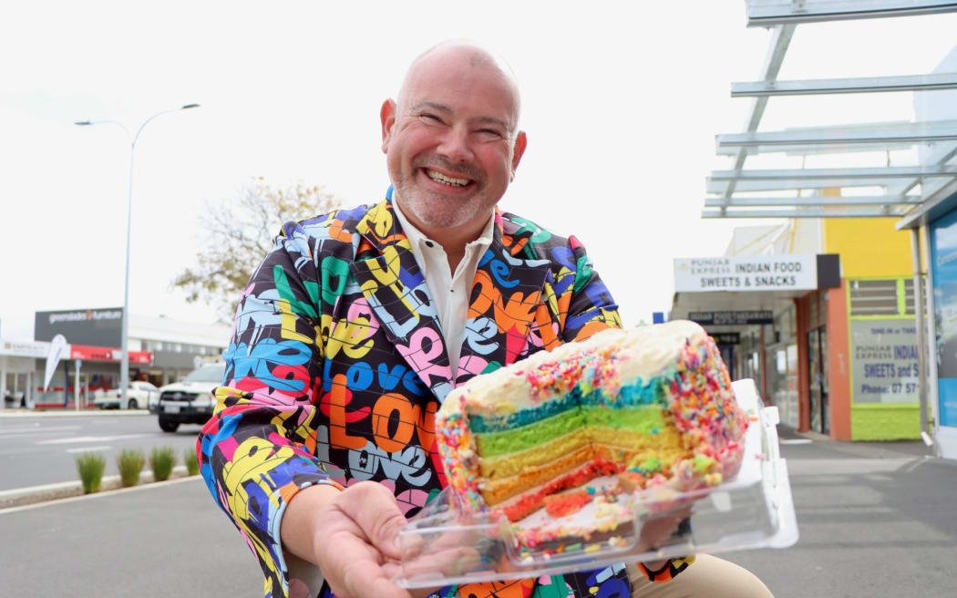 Pride advocate Gordy Lockhart celebrated the decision to install a pride crossing in Tauranga with cake. Photo: Alisha Evans/SunLive.