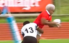 Crown Prince Tupouto'a and around 4000 Tongans watched the battle, the highlight of 100 years of rugby celebrations, marking the first time the two countries met in a Test match in 1924.