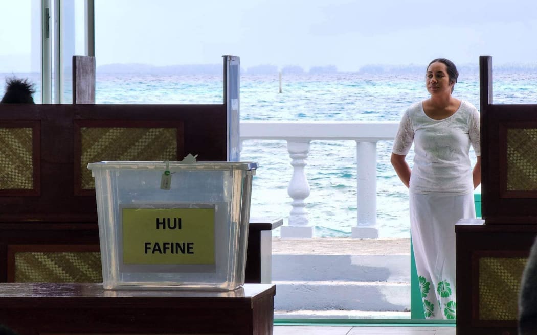 Voters for the Tokelau election place their votes.