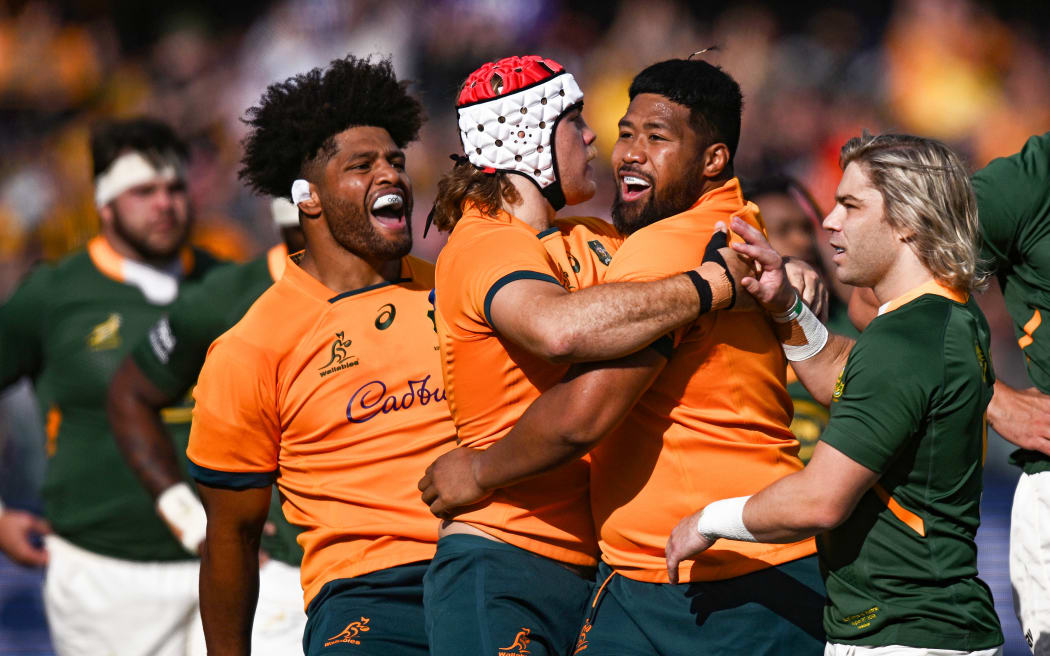 Australia celebrate a try during their Rugby Championship test against South Africa in Adelaide.