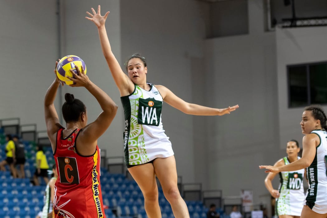Cook Islands Wing Attack Rochelle Teiri in full flight against PNG.