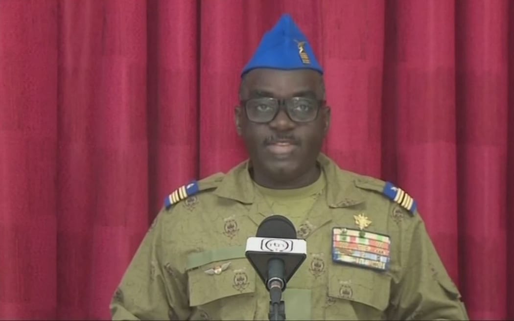 Colonel Major Amadou Abdramane, a CNSP (National Council for the Safeguard of the Homeland) member, reading a statement on national television (image obtained on 13 August, 2023).