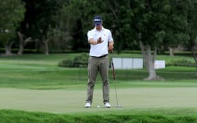 The Australian golfer Adam Scott with his long putter.