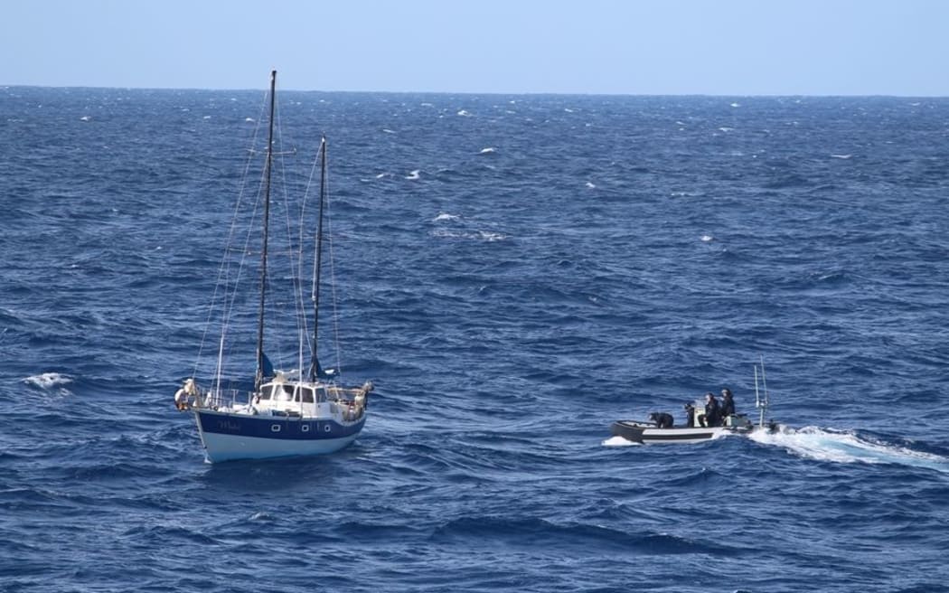The naval crew came to the aide of the stricken yachtsman.