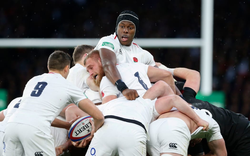 Maro Itoje and Brad Shields of England.