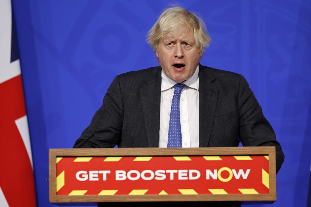 Britain's Prime Minister Boris Johnson speaks at a press conference to update the nation on the Covid-19 booster vaccine program on 15 December.