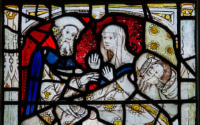 Detail, Act of Mercy window, All Saints' church, York. 1410, possibly by John Thornton.