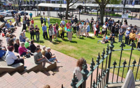 About 100 people gathered at The Octagon, Dunedin, in protest against Covid-19 health measures.