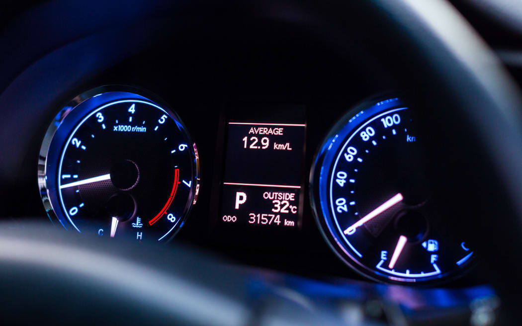speedometer car mileage close up car temperature