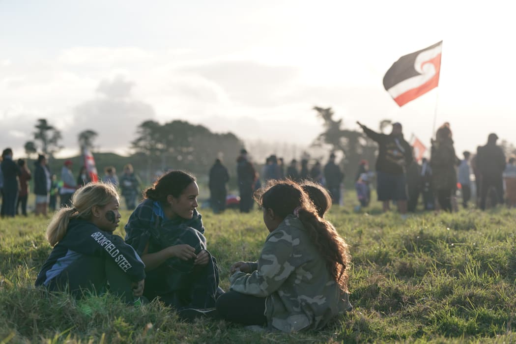 Pania Newton speaks to tamariki at Ihumātao.